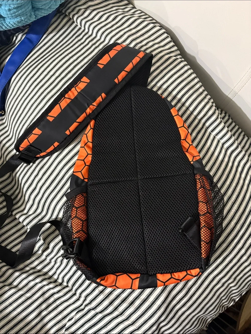 Orange and Black Hex-Pattern Sling Bag